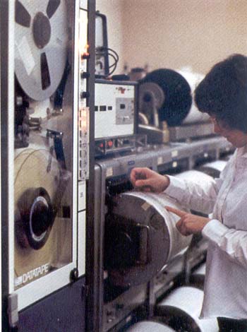 At Caltech laboratories en Pasadena, a conventional seismometer is checked for recent earthquake activity around the world