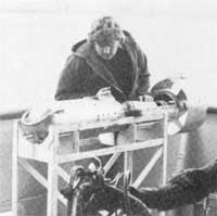 Timothy Ambrose, Technician, checks the towbody used for geochemical research off the Hollis Hedberg. Gulf's geophysical vessel